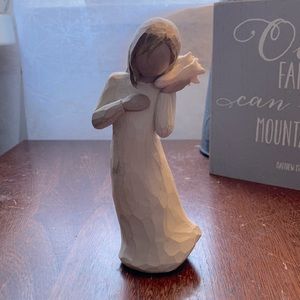 Willow tree girl holding seashell